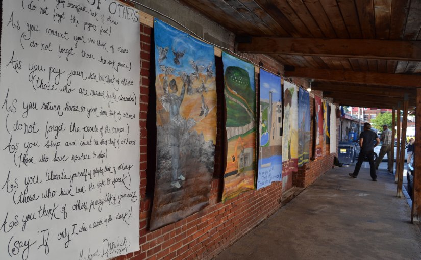 Photo of the "Think of Others" exhibit at Art Hop.