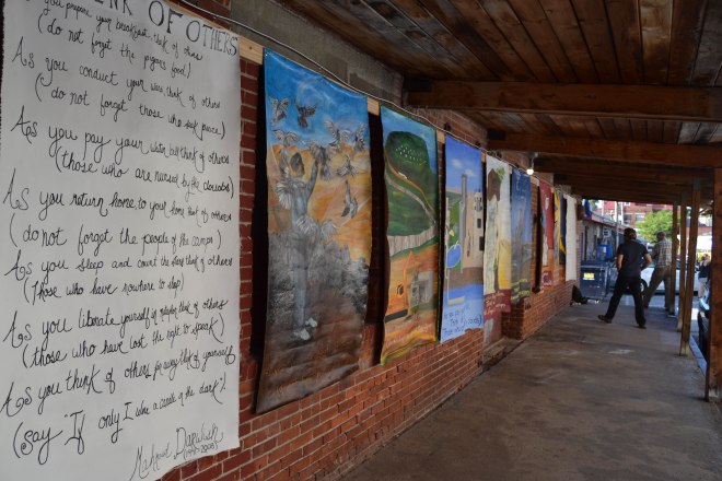 Photo of the "Think of Others" exhibit at Art Hop.